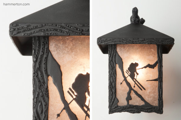 outdoor sconce features a custom sports motif