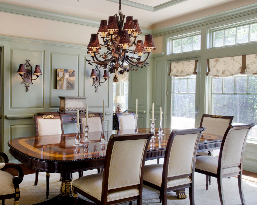 A formal organic dining room chandelier and sconces