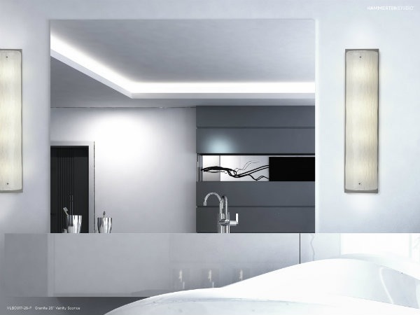Two Textured Glass vanity lights in Granite subtly draw the eye with intriguing textures that add movement and dynamic interest.