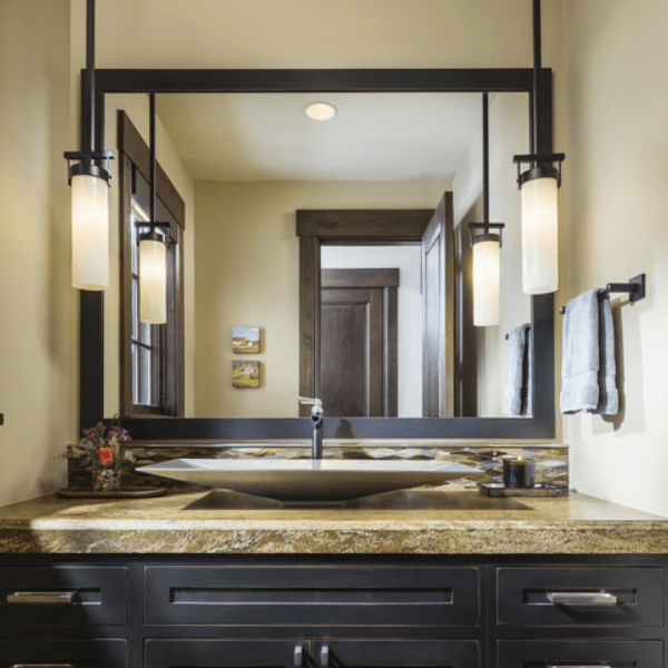 This transitional powder room features two contemporary LA2095 sconces from Hammerton Heritage. Interiors: Roxbury Studios l Salt Lake City UT