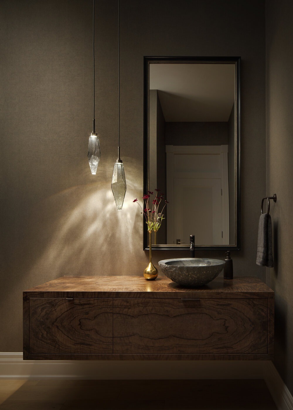 Rock Crystal pendants from Hammerton Studio enhance the dramatic mood of this luxurious powder room. Interiors: Johnson Interior Design | Calgary, AB