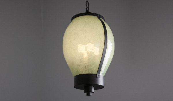  Also for the Many Glacier Hotel, this large-scale bulb pendant is custom crafted with a slumped organic ecoresin lens material and matte black finish. 