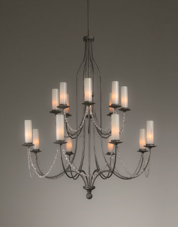  From the Hammerton Chateau collection, a traditional European chandelier silhouette is updated with tumbled rock crystal swag and sleek glass cylinders to complement a broad range of interior styles. 