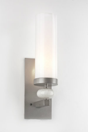  This light glass cylinder sconce, featuring a blown starlight glass disc and a beautiful royal silver finish, can uplift any contemporary space. 