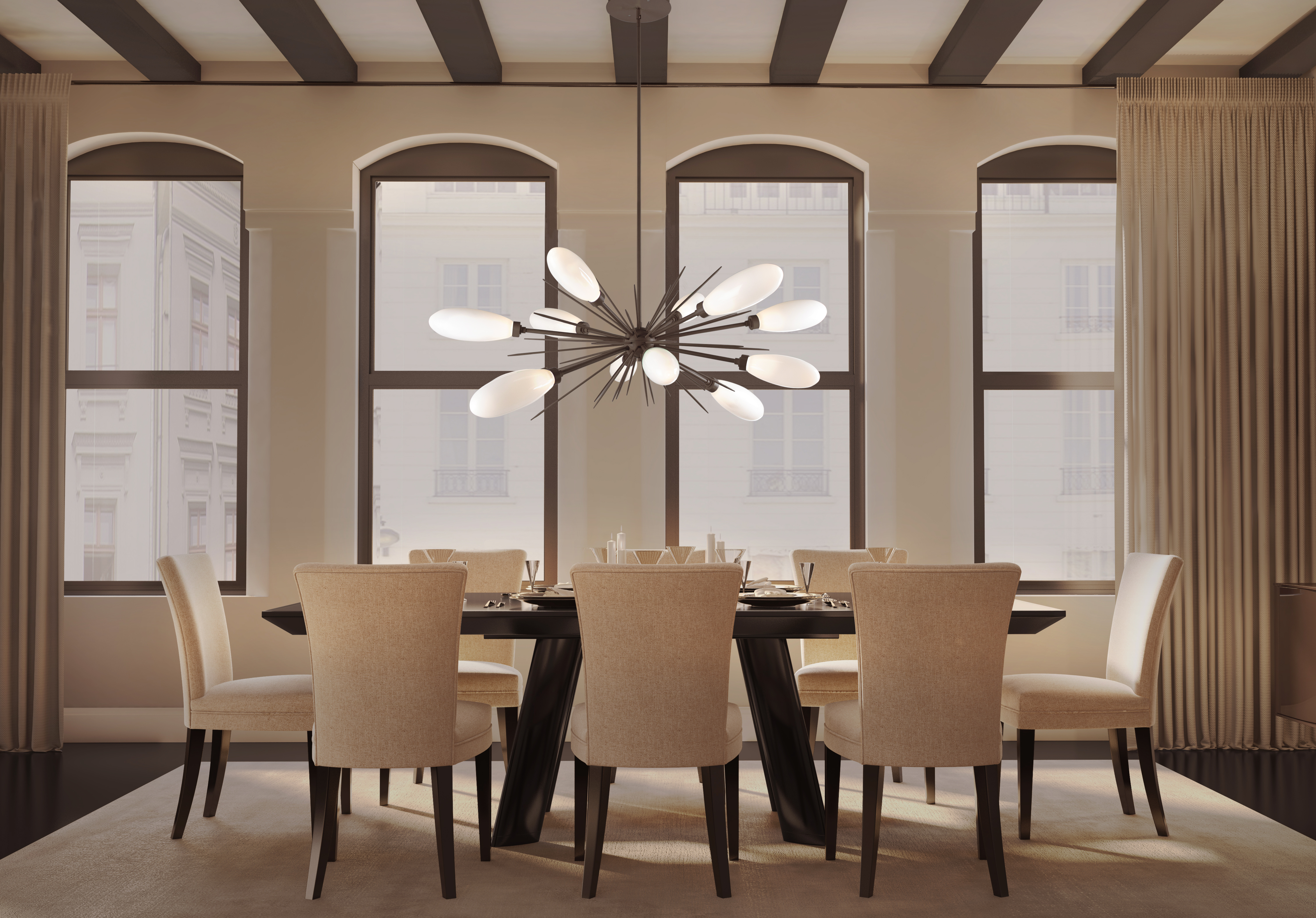 A Hammerton Studio Fiori oval chandelier hangs perfectly over a beautiful dining room table