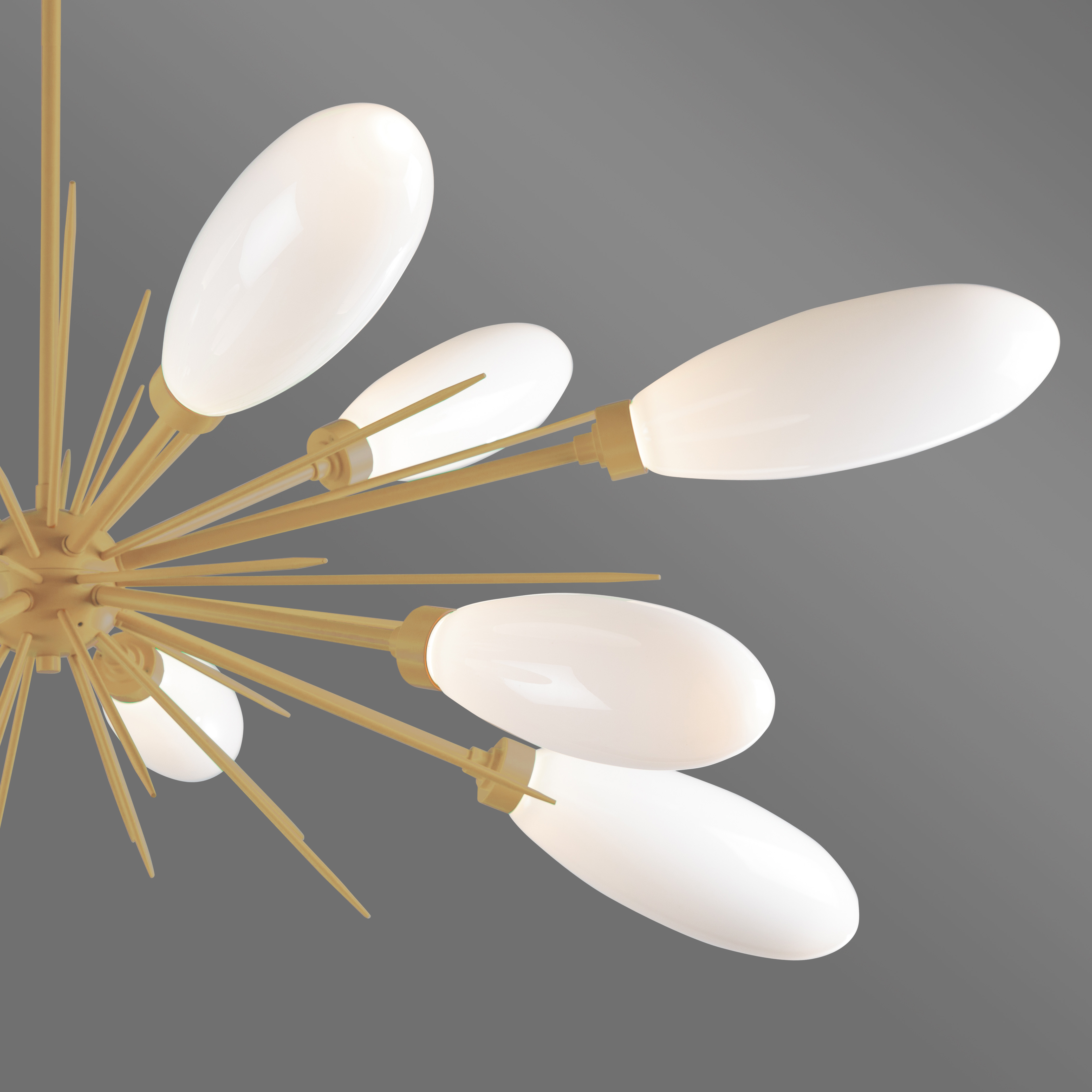 Closeup detail of a Hammerton Studio Fiori starburst chandelier with brass finish and white oval light shades.