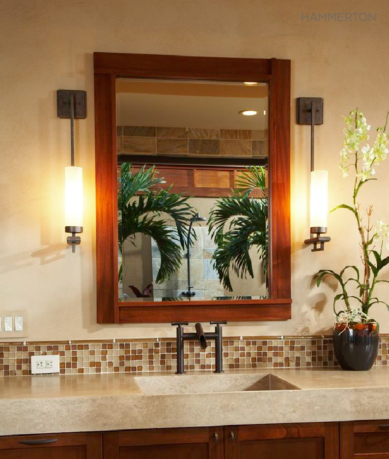  Exotic woods, a beach-inspired color palette and two Contemporary ID2066 wall sconces evoke sophisticated tropical style in this Hawaiian powder room. Interior design by Willman Interiors. 