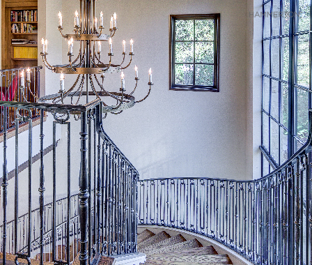  A graceful chateau chanA graceful Chateau chandelier perfectly complements this stately European-style staircase. Architecture &amp; interiors by Duvall Architects. 