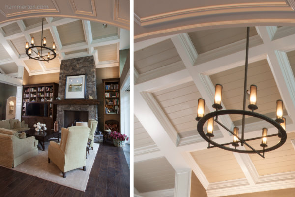 A simple transitional chandelier featuring a traditional shape and contemporary materials highlights this living room's mix of classic and modern aesthetics.