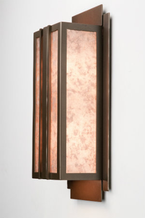  This refined custom sconce features beautiful clean lines, while maintaining a touch of organic appeal. 