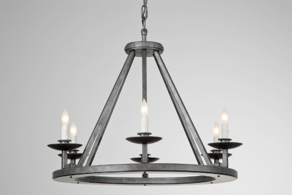  This candle fixture's bold geometric form and hand-applied finish can complement a wide variety of interior styles. 