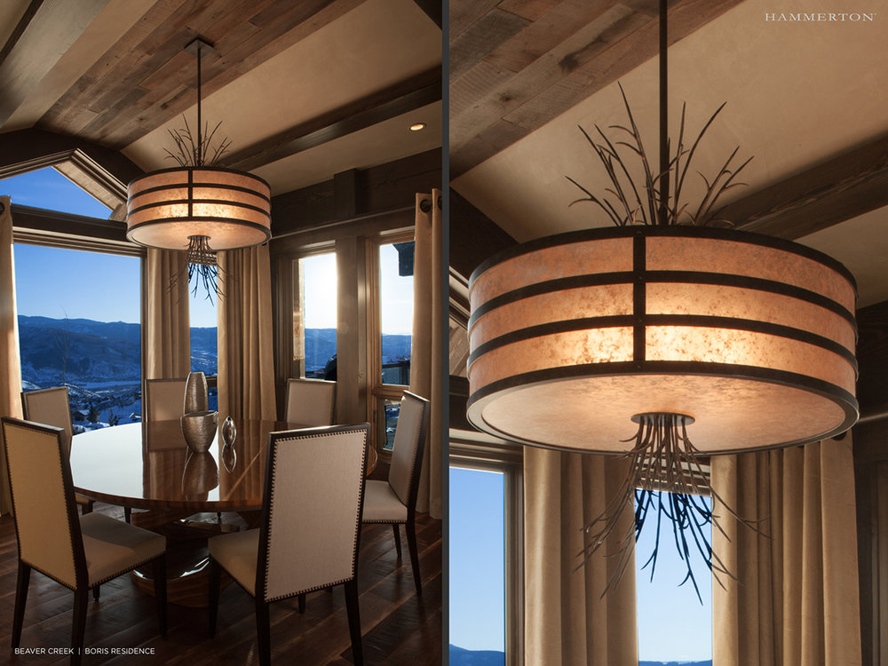 Wisps of grass add an organic element to the CH2299 chandelier seen in this dining room designed by AP Resort Concepts | Edwards, CO