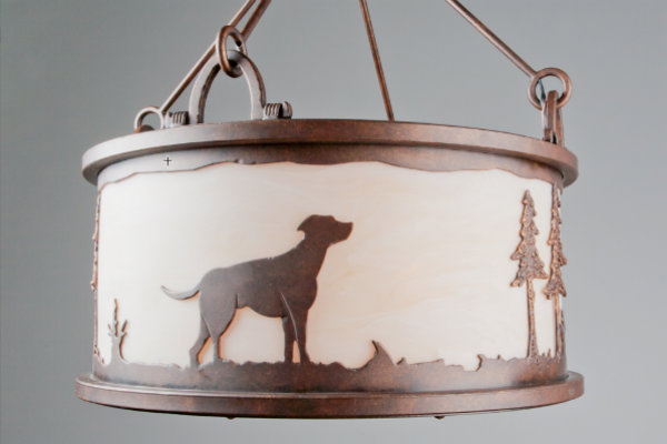  A client gave us a few photographs of her dog to incorporate in one of her light fixtures, shown here. 