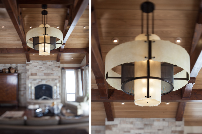 A 60 inch chandelier in the great room features slumped texture glass 