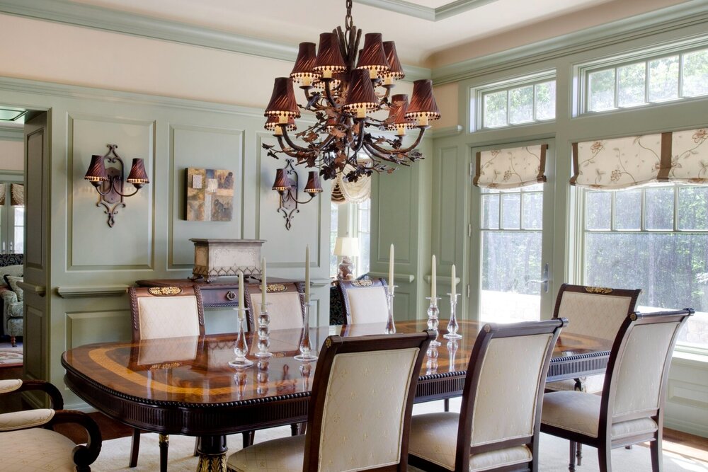 A jaw-dropping formal dining room featuring a modified Hammerton Heritage CH7001 chandelier | Interiors by Randi | Moultonborough NH