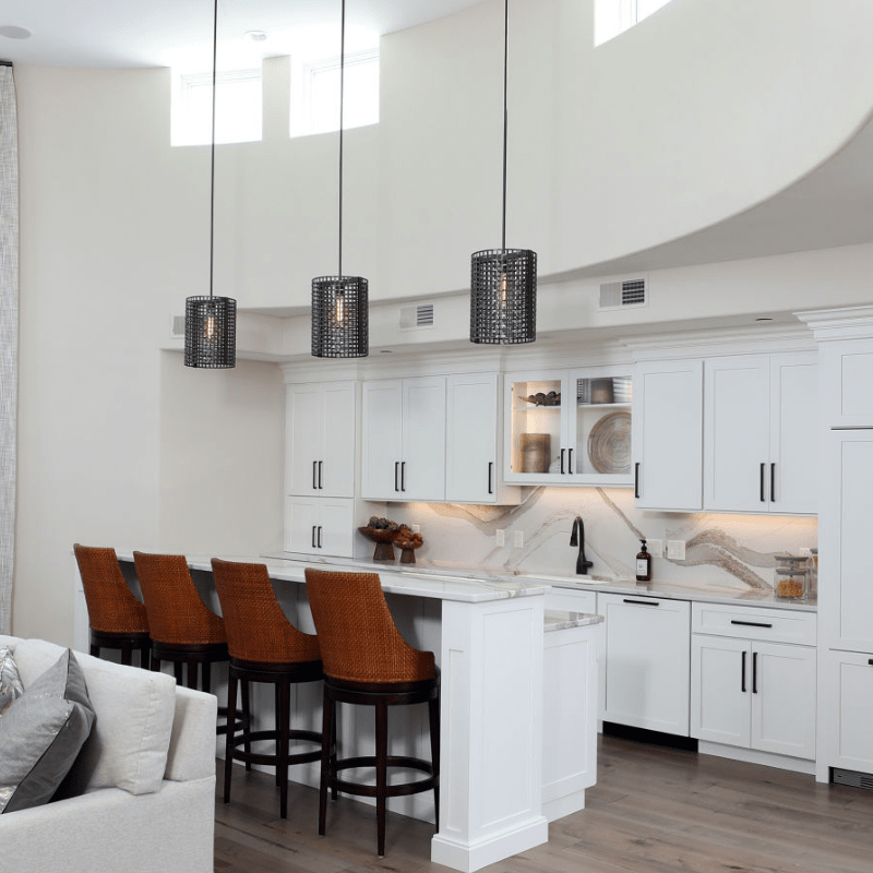 industrial kitchen island lighting with Hammerton Studio Tweed pendant lights featuring thick steel mesh around an exposed incandescent bulb