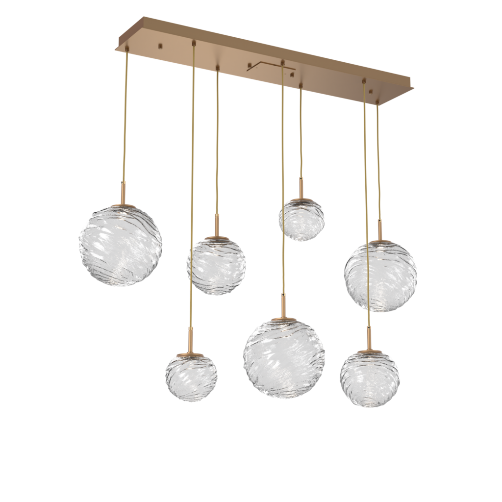 PLB0092-07-NB-C-Hammerton-Studio-Gaia-7-light-linear-multi-pendant-chandelier-with-novel-brass-finish-and-clear-blown-glass-shades-and-LED-lamping