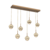 PLB0093-07-NB-A-TR-Hammerton-Studio-Cabochon-7-light-linear-multi-pendant-chandelier-novel-brass-finish-amber-blown-glass-shades-travertine-stone-accent-LED-lamping